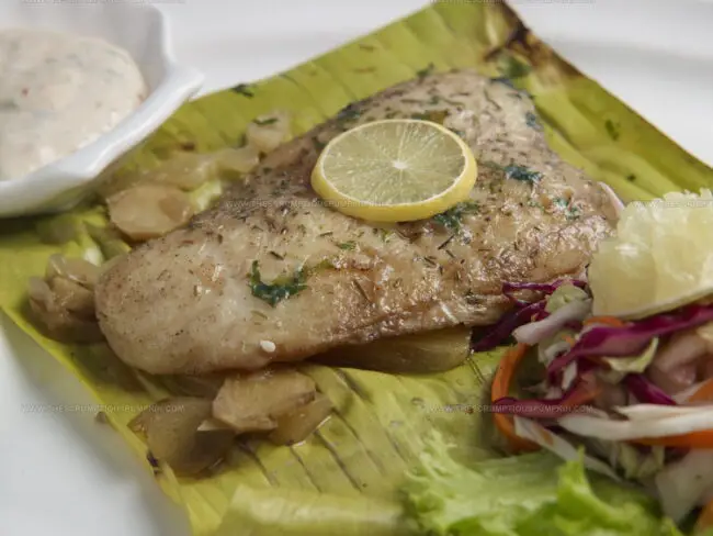 What Role Does Coconut Milk Play in Oceanian Seafood Dishes?
